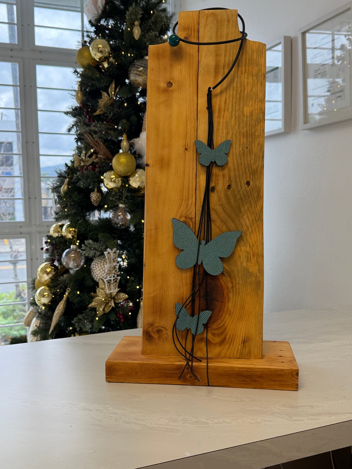 Marcella Duce blue leather butterflies